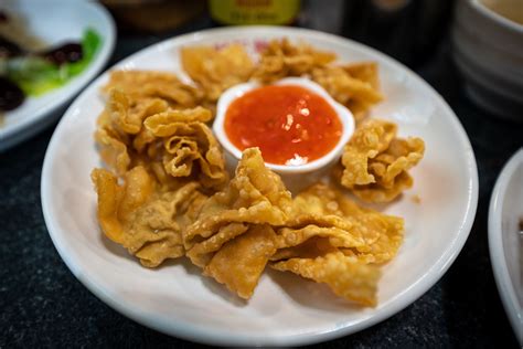  Wonton di Jiangmen: Un tuffo rinfrescante nelle acque speziate del sud della Cina?